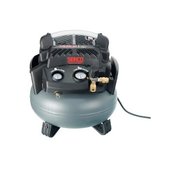 A portable air compressor with a gray tank, black motor housing, two gauges, and a hose connection on a flat base.